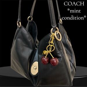 Coach Madison Carlyle Black and Gold Hobo Bag with Slouchy Silhouette